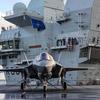 The British aircraft carrier HMS Queen Elizabeth, carrying fifth-generation F-35B Lightning II fighters, has transferred to NATO command for the first time in history-23