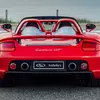Thumbnail of close-up shot of Porsche Carrera GT in Guards Red wheel