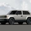Slate electric pick-up truck with a body.