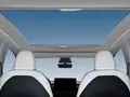 Tesla наконец-то признала, что панорамная крыша — это жарко: выдвижная шторка для Tesla Model Y за 10 000 гривен
