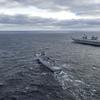 The British aircraft carrier HMS Queen Elizabeth, carrying fifth-generation F-35B Lightning II fighters, has transferred to NATO command for the first time in history-34
