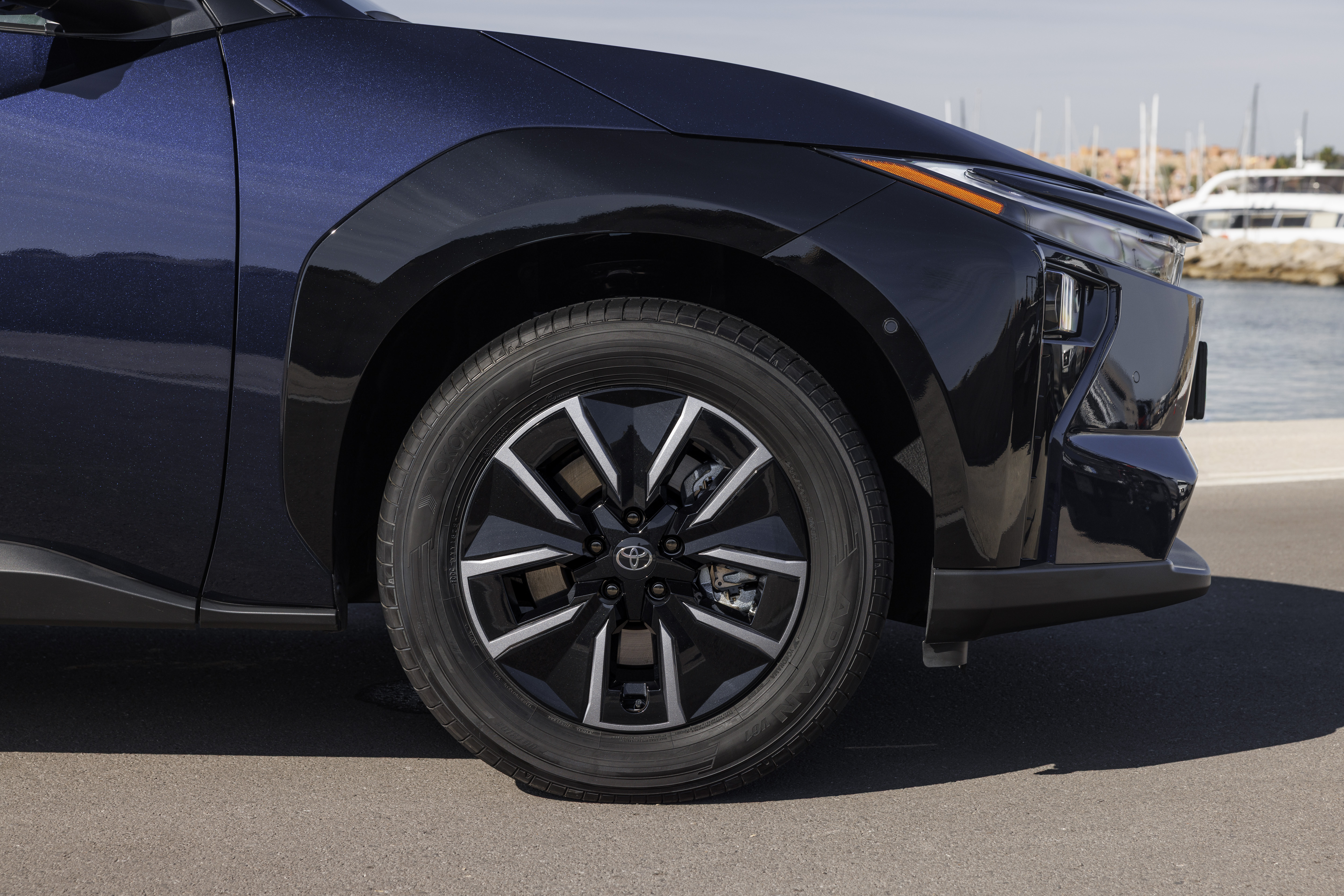 2026 Toyota bZ4X, front three-quarter view in deep blue metallic