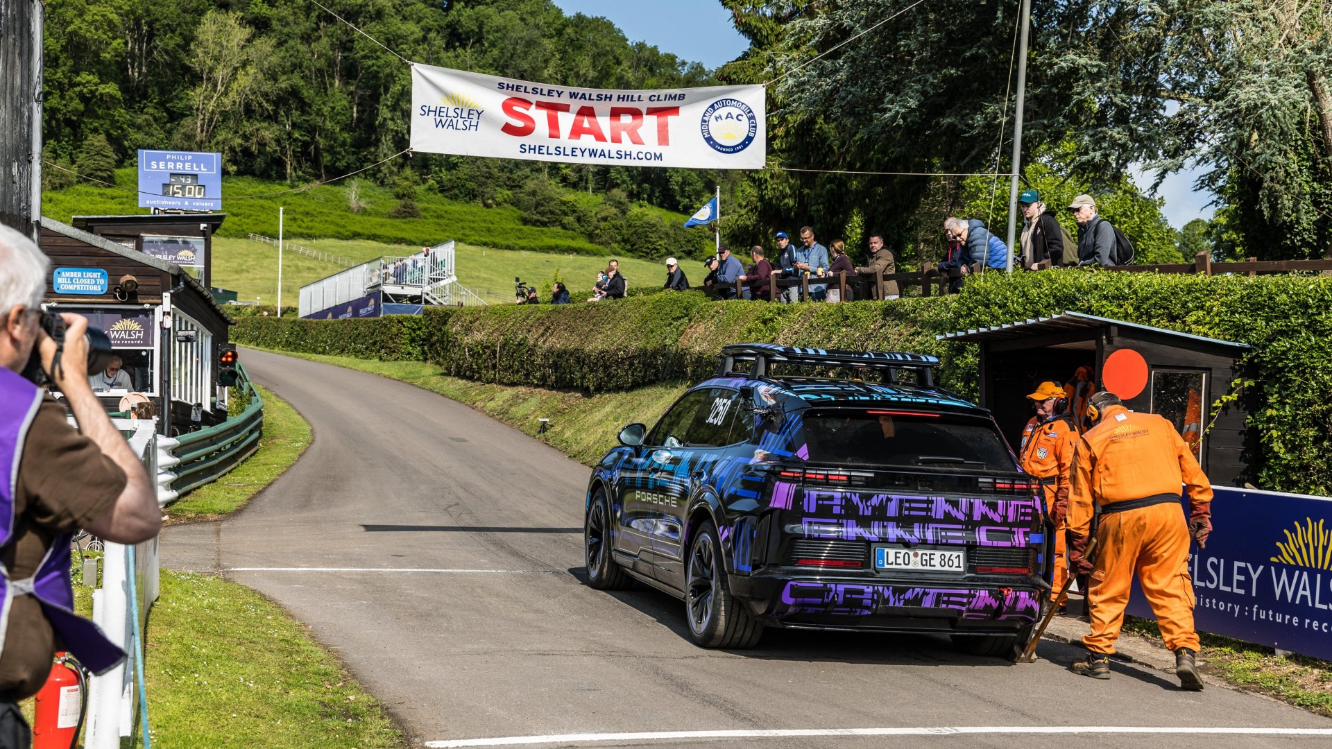 Gabriela Jilkova driving an electric Cayenne.