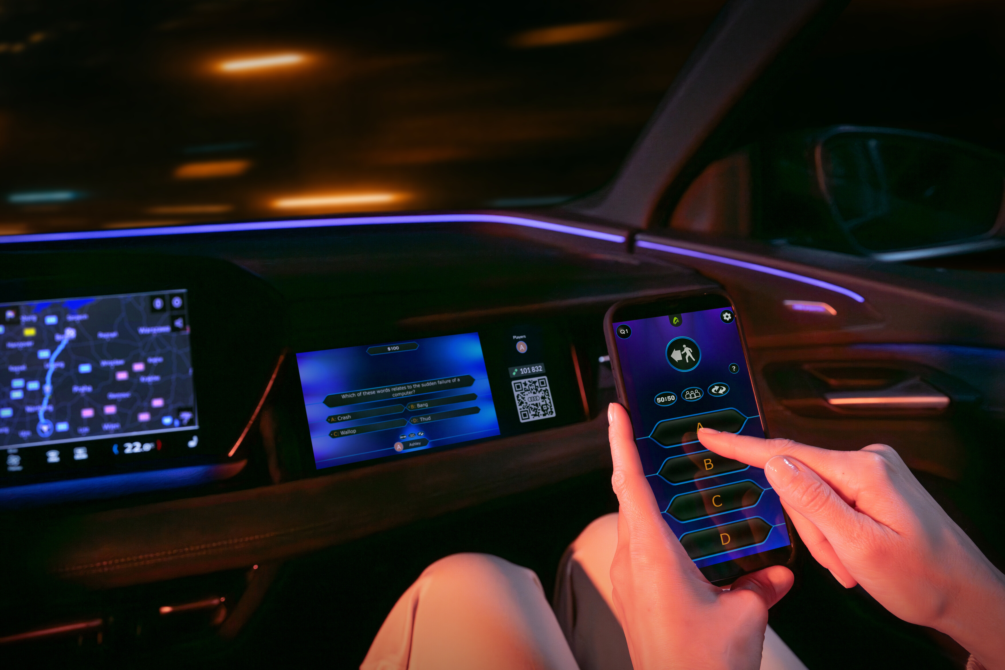 Passengers play games in an Audi car