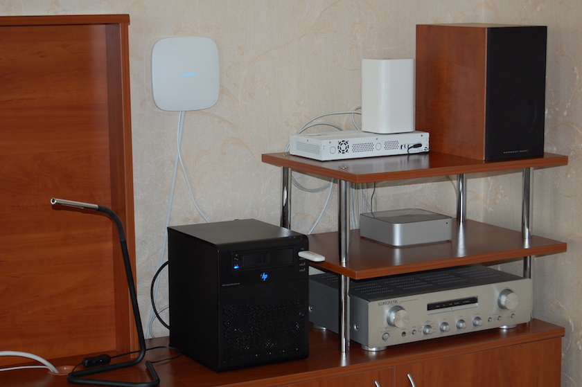Ajax Hub attached to the wall in the living-room