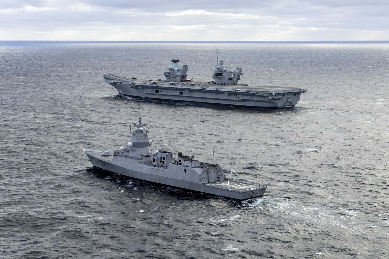 The British aircraft carrier HMS Queen Elizabeth, carrying fifth-generation F-35B Lightning II fighters, has transferred to NATO command for the first time in history-17
