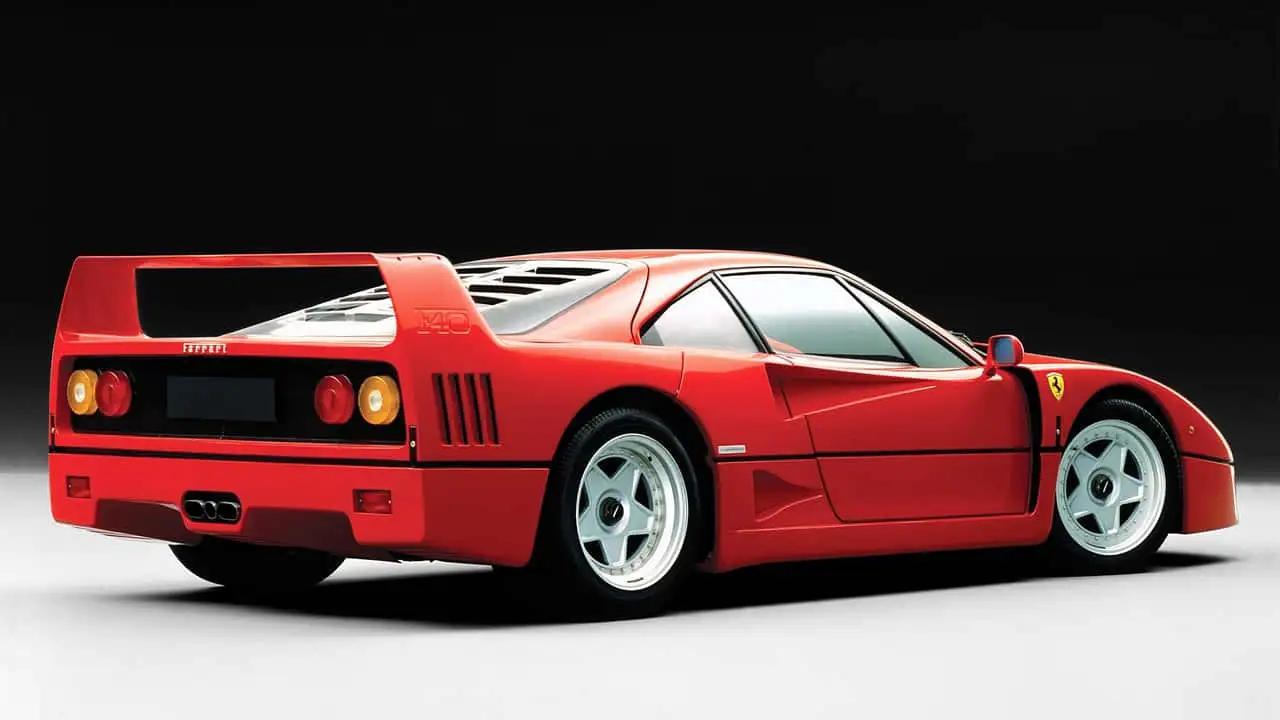 Lewish Hamilton next to Ferrari F40