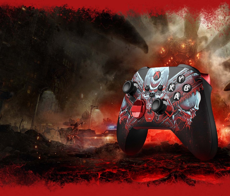 La manette Gears of War : E-Day avec ses fissures rouges en relief et le symbole COG au centre.