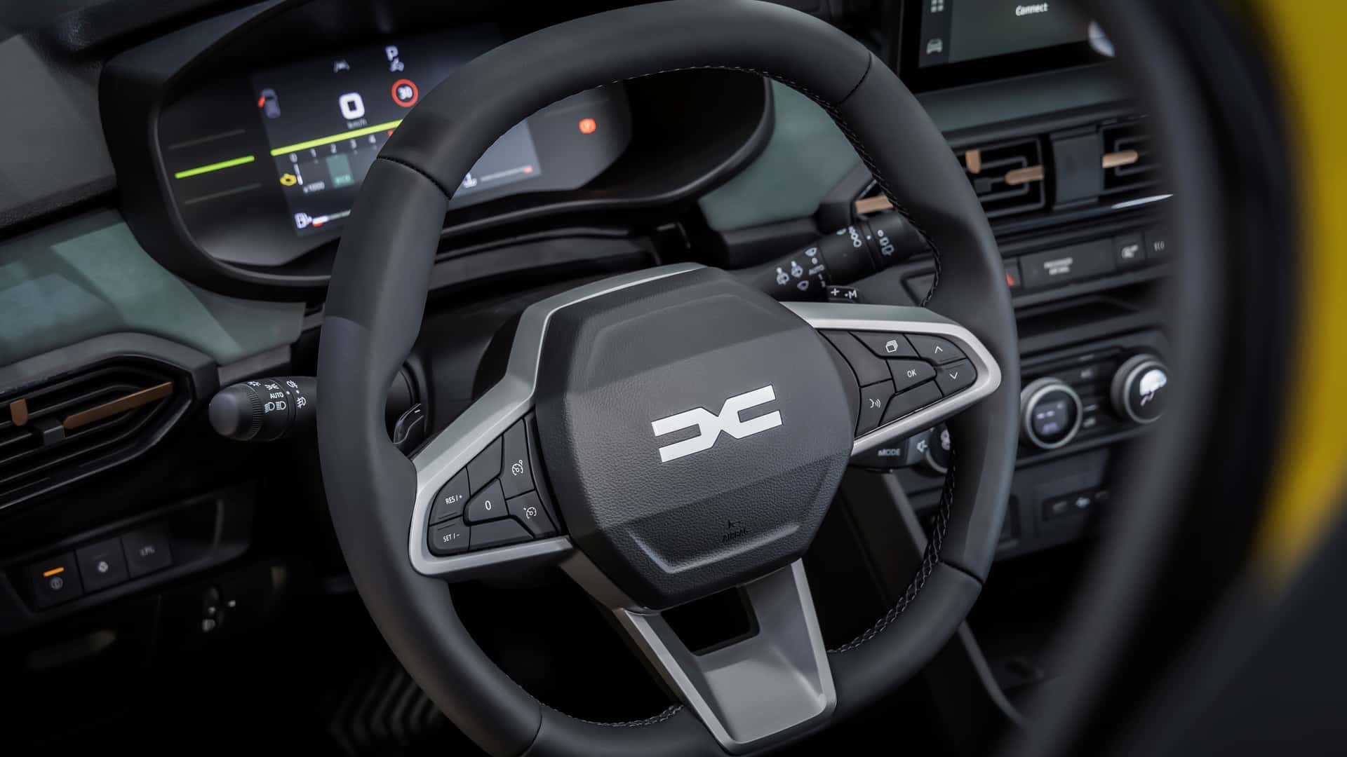 Салон з функціональними деталями Dacia Sandero Stepway Hybrid 2026