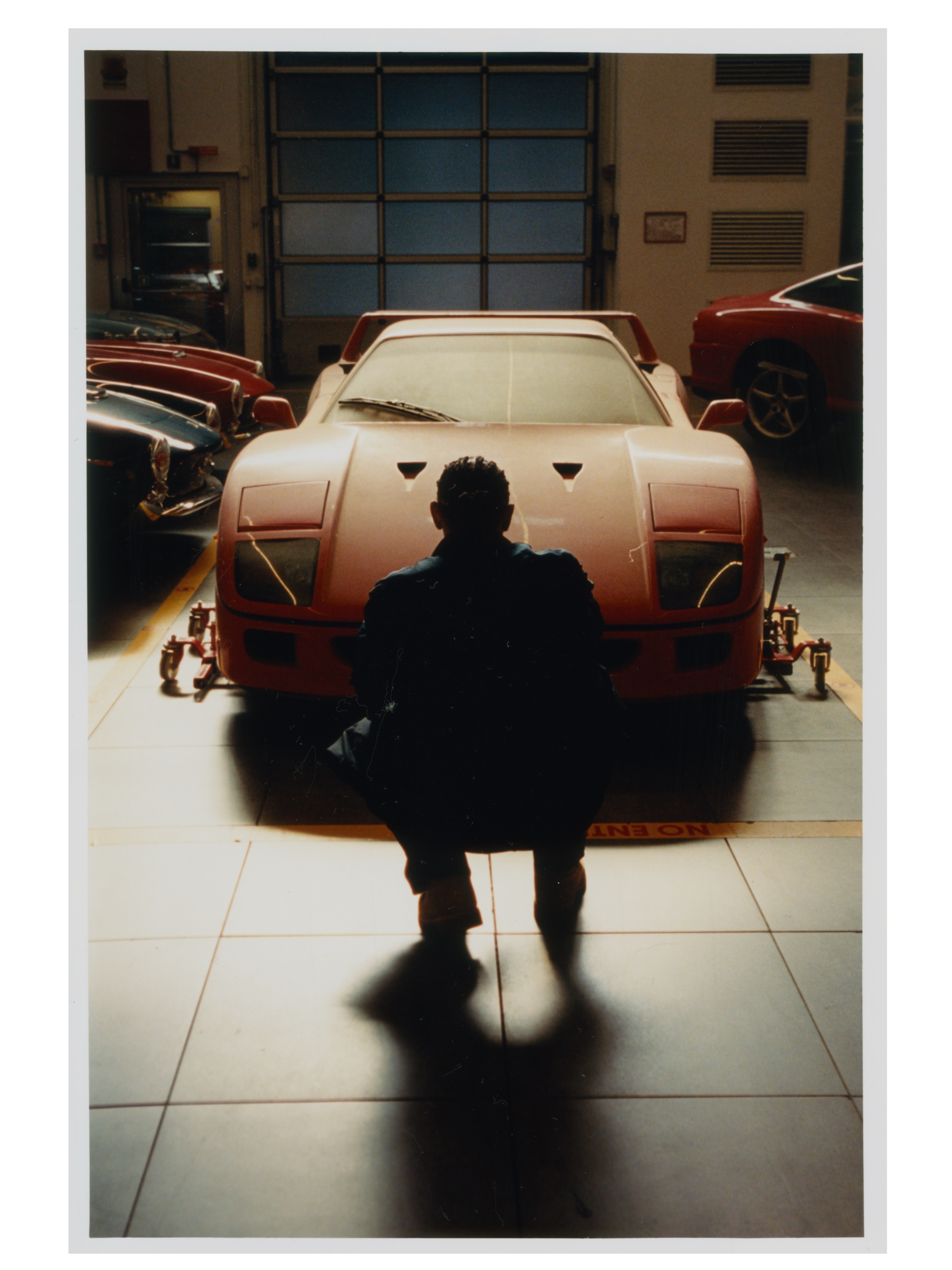Rear side of Louis with Ferrari F40